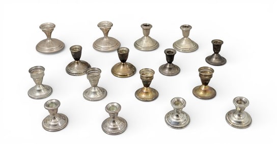 EIGHT PAIRS WEIGHTED STERLING SILVER CANDLE HOLDERS