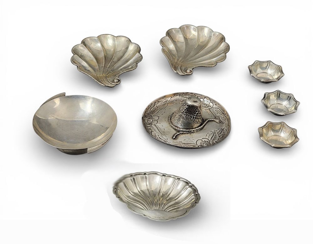 COLLECTION OF STERLING SILVER HOLLOWWARE: Collection of sterling hollowware, inc. Steiff, Smith & Smith, and R. Wallace & Sons. Etched sombrero tray, mid-century-modern compote, and 6 misc. scalloped/shell-form nut dishes. Sombrero 2.5" high,