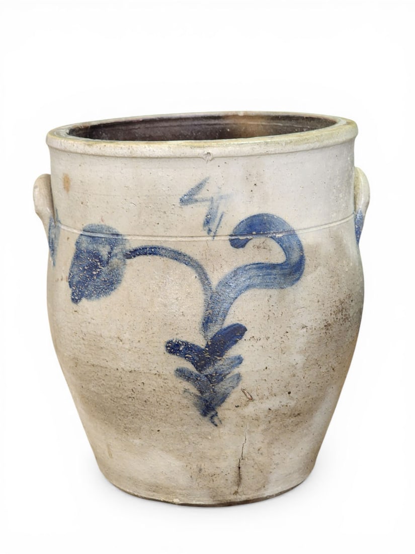 OHIO DECORATED STONEWARE JAR: Probably Akron area, 3rd quarter-19th century. 4-gallon jar with applied handles and cobalt tulip. 13.5" high. Provenance: Collection of Bob and Maxine Edwards, New Philadelphia, Ohio NOTE: We are