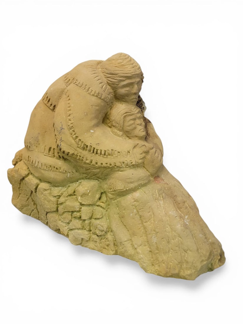 CARVED STONE NATIVE AMERICANS: Cook, Ohio, 20th century. Caricaturish carving of two Native Americans hugging. 15.75" long. Provenance: an Ohio collection. NOTE: We are happy to answer questions and take additional photos of lots p