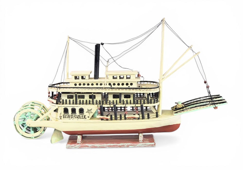 FOLK ART MODEL OF STERNWHEELER: American, mid-20th century, wood and metal. "River Belle" steamboat on base. 23" long. Provenance: Collection of Bob and Maxine Edwards, New Philadelphia, Ohio NOTE: We are happy to answer questions