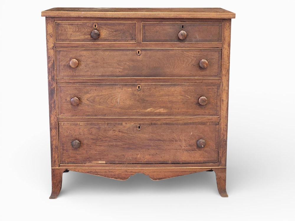 OHIO HEPPLEWHITE CHEST OF DRAWERS: Found in Canton, 1810-1825, walnut and poplar Four graduated drawers and French feet; the case with cross-banded inlaid decoration. 42.5" high, 41.75" wide, 21" deep. Provenance: an Ohio collection.