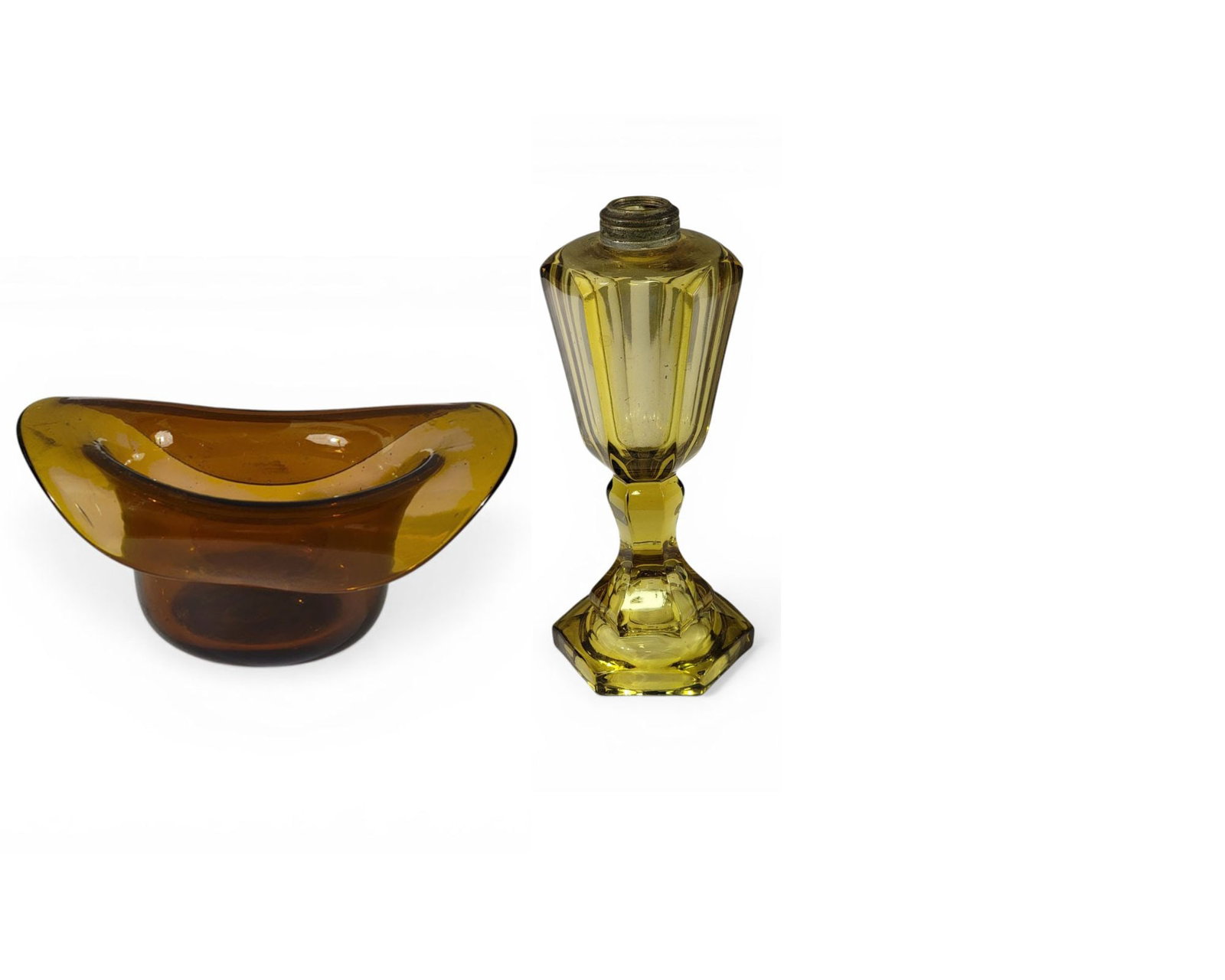 THREE PIECES OF EARLY GLASS: American, 19th century. Includes a yellow-amber pressed lamp, 9" high; an amber hat whimsey with pontil mark, 6.25" long; and a dark blue witches ball, 4" diameter. Provenance: an Ohio collection.