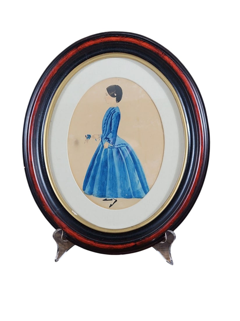 PORTRAIT OF A YOUNG LADY: American, mid-19th century, watercolor on paper. Full-length portrait of a young lady in a blue dress, identified on back as 13-year-old Mary Ann Whit Burford Wals (born July 10, 1840). 7.25" high,