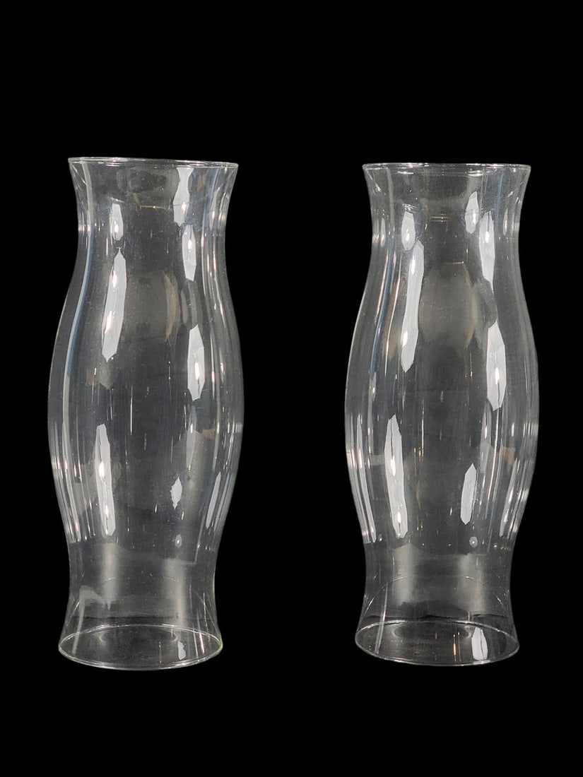 PAIR OF BLOWN GLASS HURRICANE SHADES: Probably 19th century. Of typical shape, 20" high, 6.75" diameter. Provenance: an Ohio collection. NOTE: We are happy to answer questions and take additional photos of lots prior to the auction (the