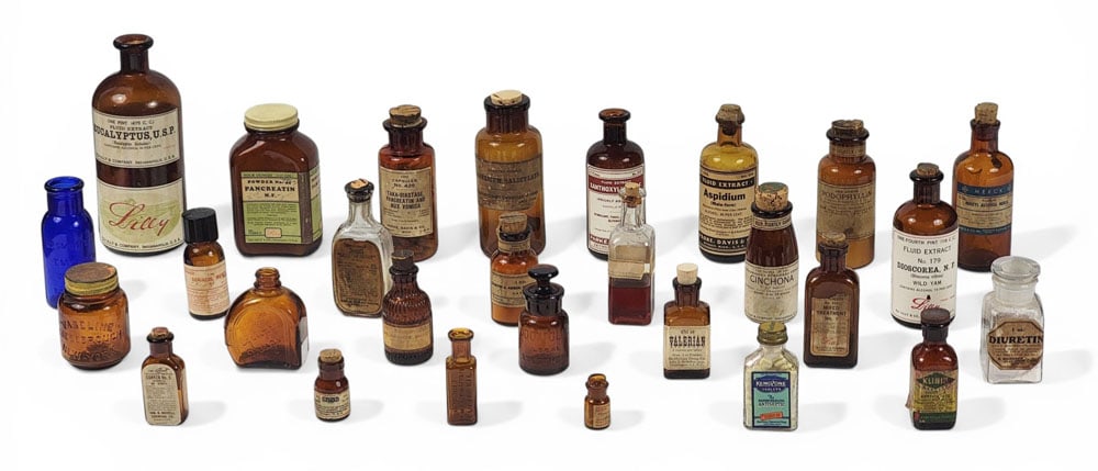 COLLECTION OF MEDICINE BOTTLES (1 of 5)
