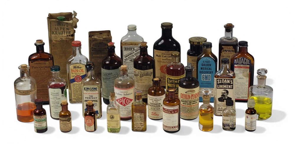 COLLECTION OF MEDICINE BOTTLES (1 of 4)