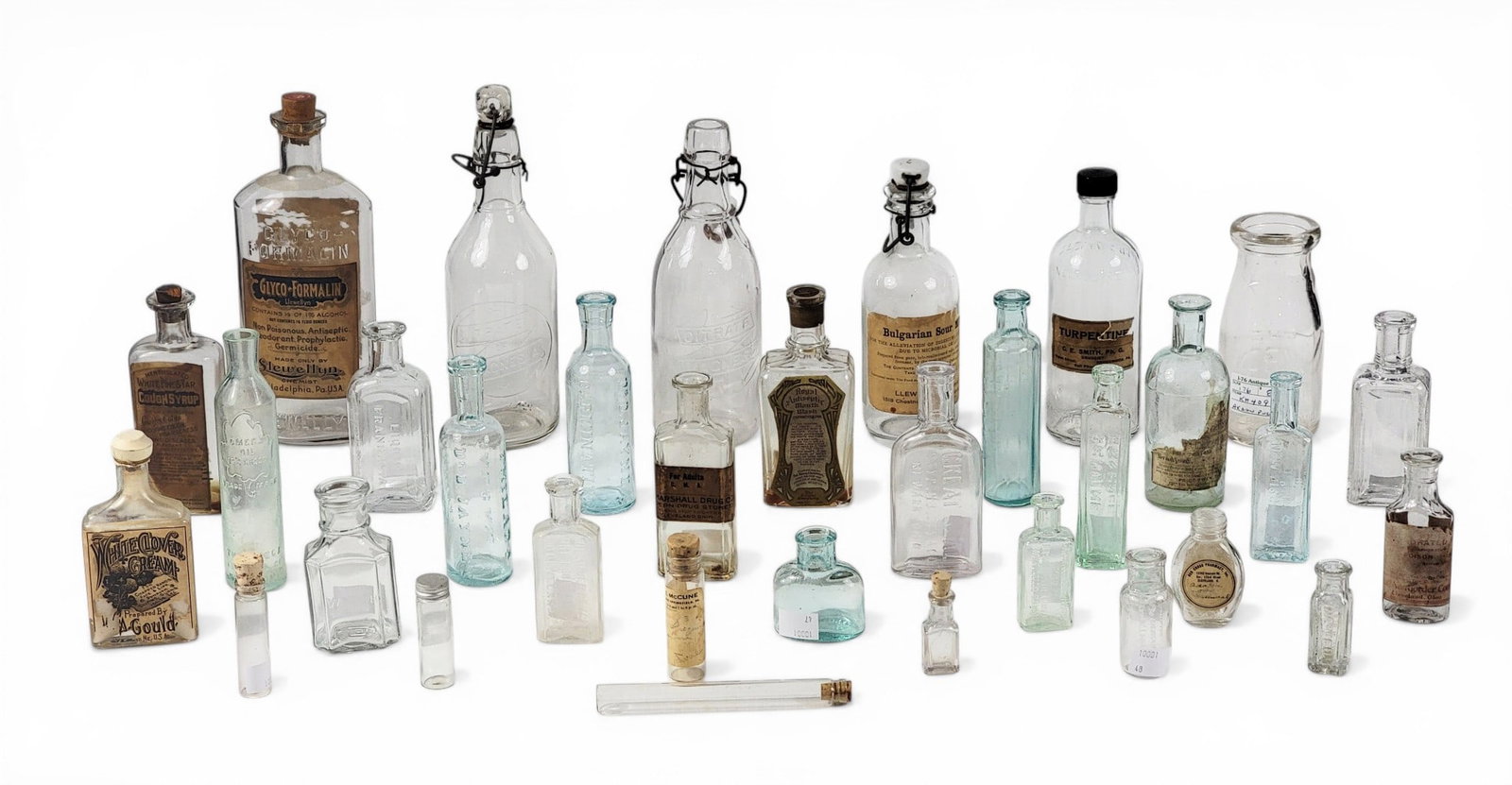 COLLECTION OF MEDICINE BOTTLES (1 of 8)