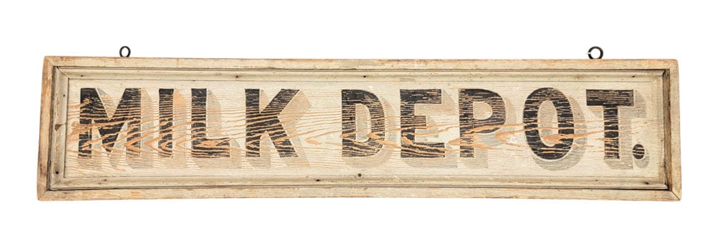 DOUBLE-SIDED "MILK DEPOT" SIGN: American, late 19th, wood. Framed, and with original black, gray, and white paint. 11" high, 49" wide. Provenance: an Ohio collection. NOTE: We are happy to answer questions and take additional