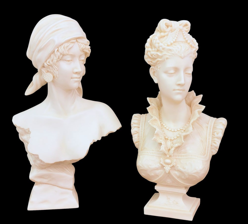 TWO REPRODUCTION SCULPTURE BUSTS: 20th century, resin. 26" and 27" high. Provenance: a southwest Ohio collection. NOTE: We are happy to answer questions and take additional photos of lots prior to the auction (the sooner submitted the