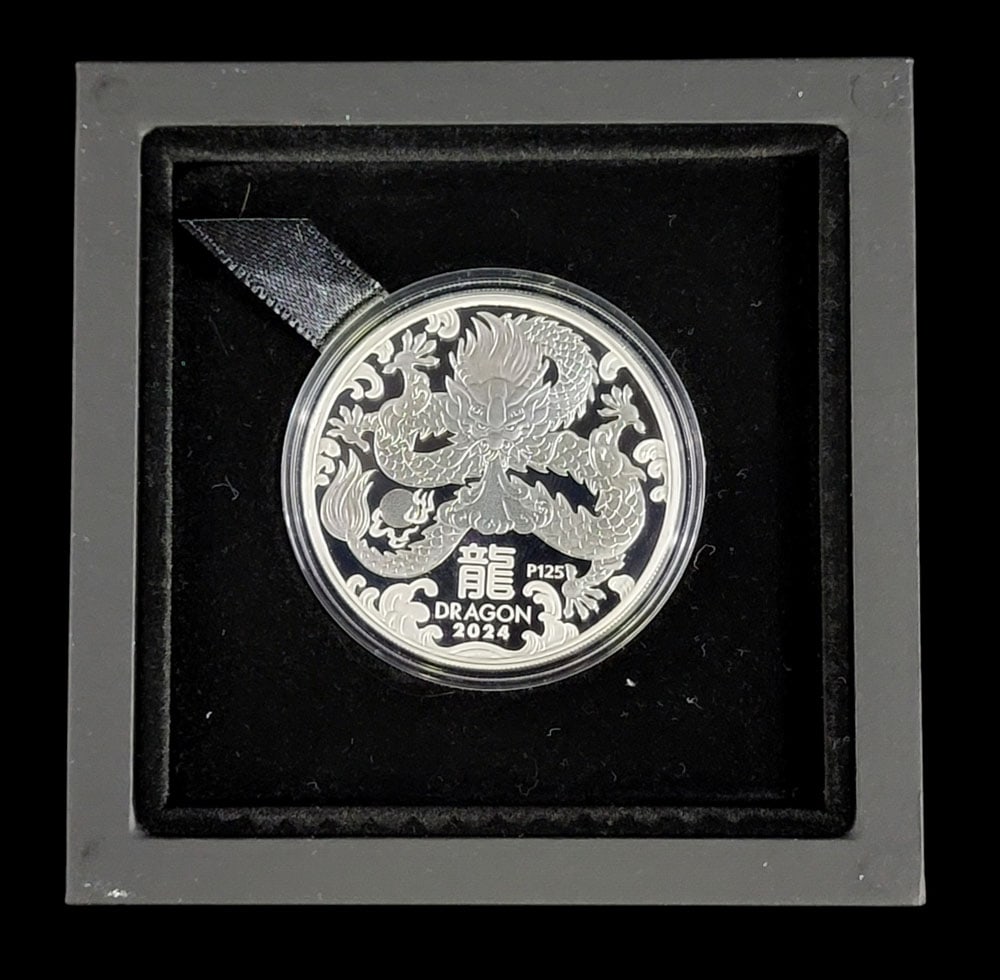 2024 AUSTRALIAN DRAGON DOLLAR COIN: Perth Mint, with box and COA (#3089). Provenance: an Ohio collection. NOTE: We are happy to answer questions and take additional photos of lots prior to the auction (the sooner submitted the better).