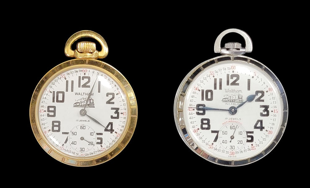 TWO WALTHAM POCKETWATCHES: Both open-face, both 17j and unadjusted, both in Waltham cases, one yellow metal and one in silver, both with railroad engraving on back of case. The yellow case is engraved for "Joe A. Fields, Jr." P