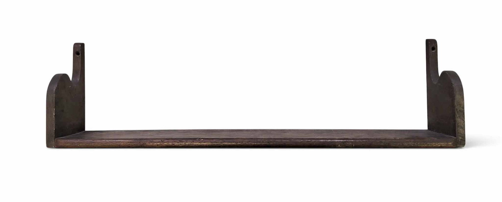 ZOAR WALL SHELF: Mid-late 19th century, walnut. Shaped ends. 9" high, 33" wide, 5.5" deep. Provenance: an Ohio collection. NOTE: We are happy to answer questions and take additional photos of lots prior to the auction