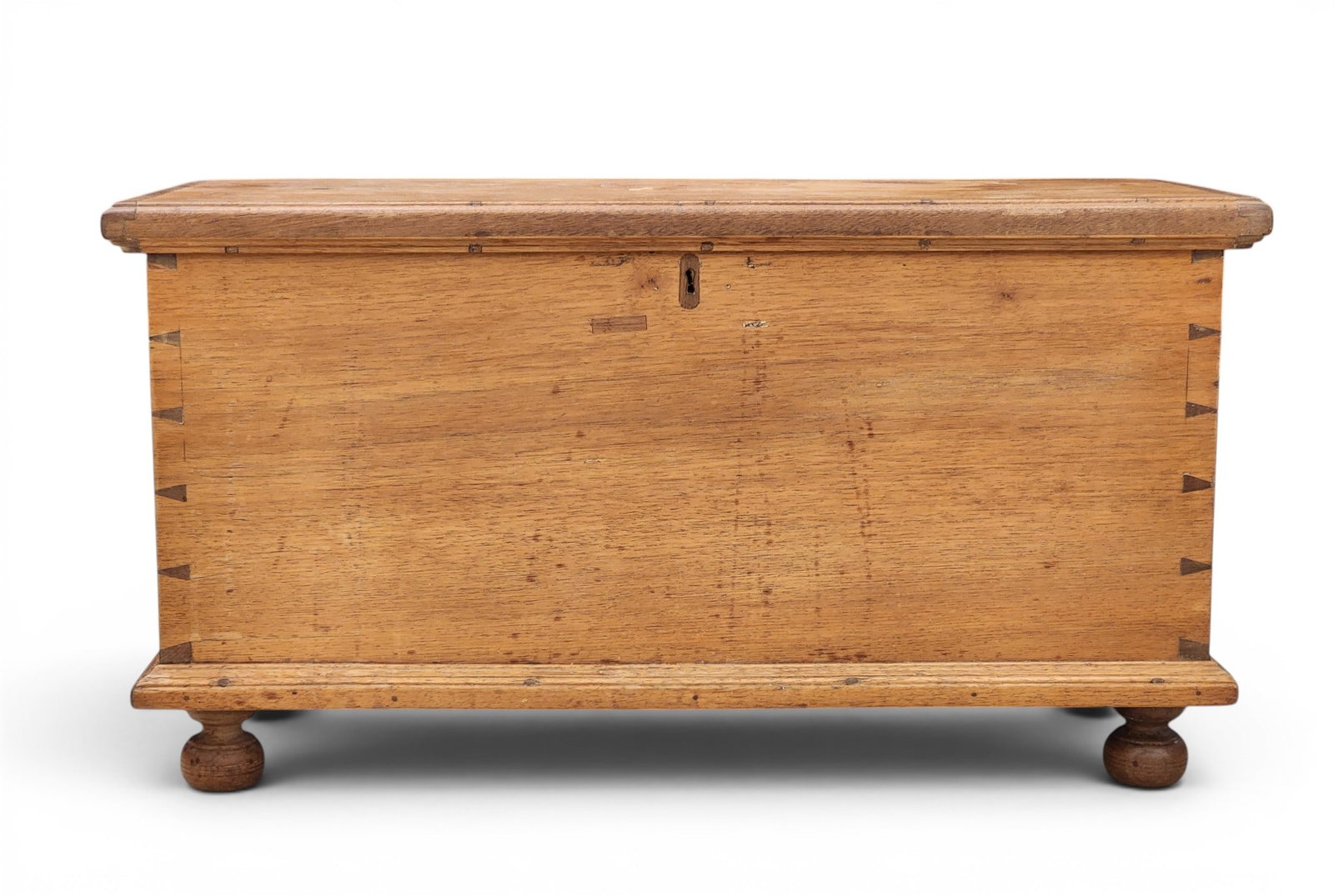 MINIATURE BLANKET CHEST: Ohio or Pennsylvania, 1st half-19th century, walnut. Dovetailed six-board chest on ball feet. 13.5" high, 25.75" wide, 12.5" deep. Provenance: Collection of Bob and Maxine Edwards, New Philadelphia,