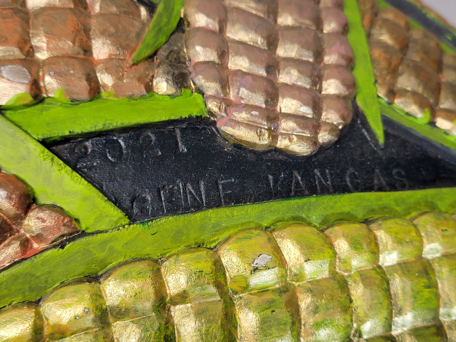 CARVED EGG BY GENE KANGAS (OHIO, B. 1944): Signed and dated 2021. A large egg with relief-carved corn. 25" long. Provenance: a West Virginia collection. NOTE: We are happy to answer questions and take additional photos of lots prior to the