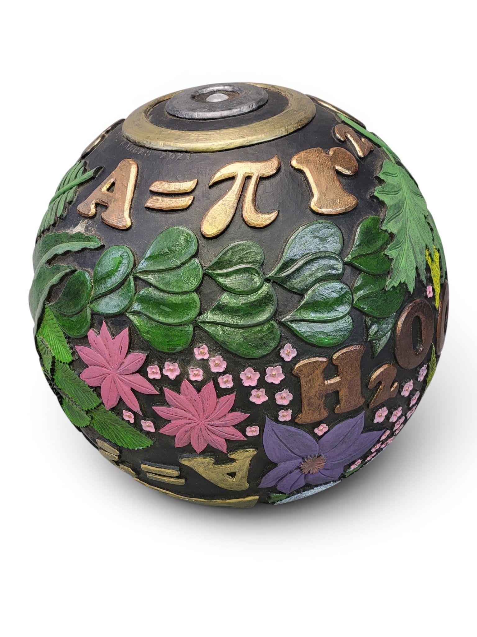 CARVED BALL BY GENE KANGAS (OHIO, B. 1944): Signed and dated 2021. A large ball with relief-carved with math, science, and flowers. 17" diameter. Provenance: a West Virginia collection. NOTE: We are happy to answer questions and take