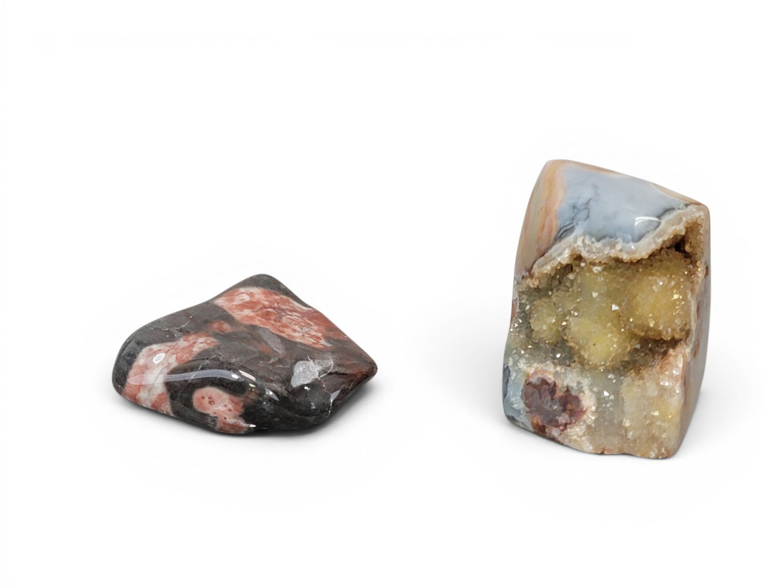 TWO POLISHED FLINT RIDGE FLINT SPECIMENS: One with vein of quartz crystals, 2.5" by 2.5" by 2". Provenance: an Ohio collection. NOTE: We are happy to answer questions and take additional photos of lots prior to the auction (the sooner