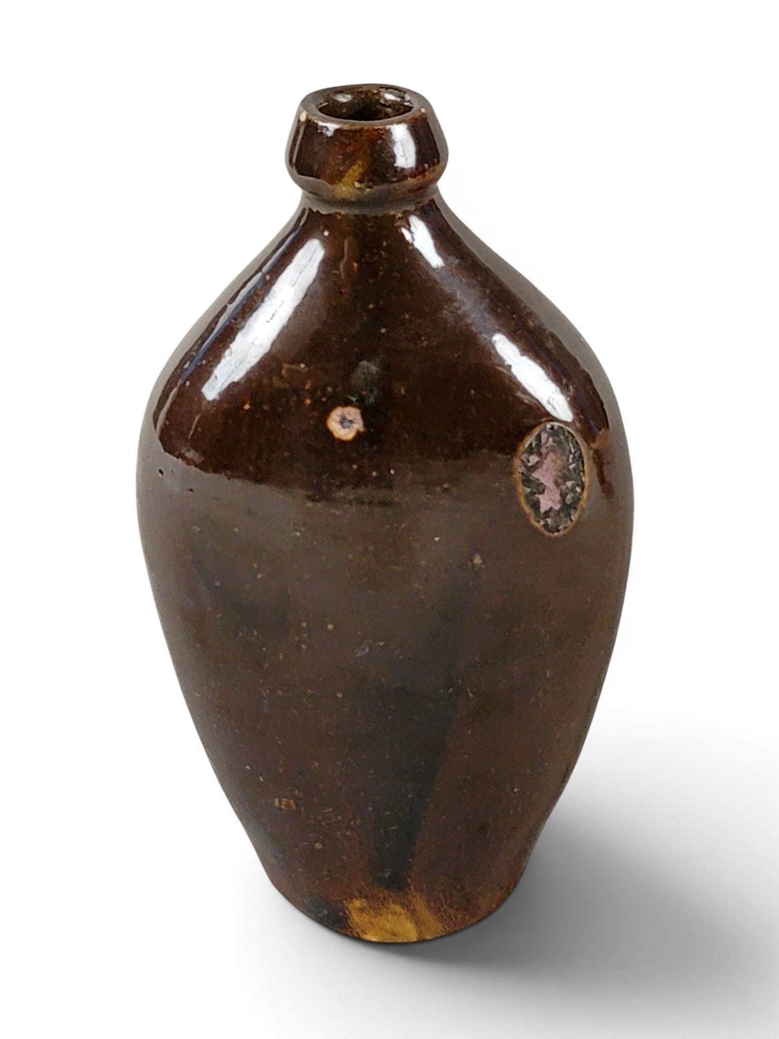 FOUR POTTERY FLASKS - 10