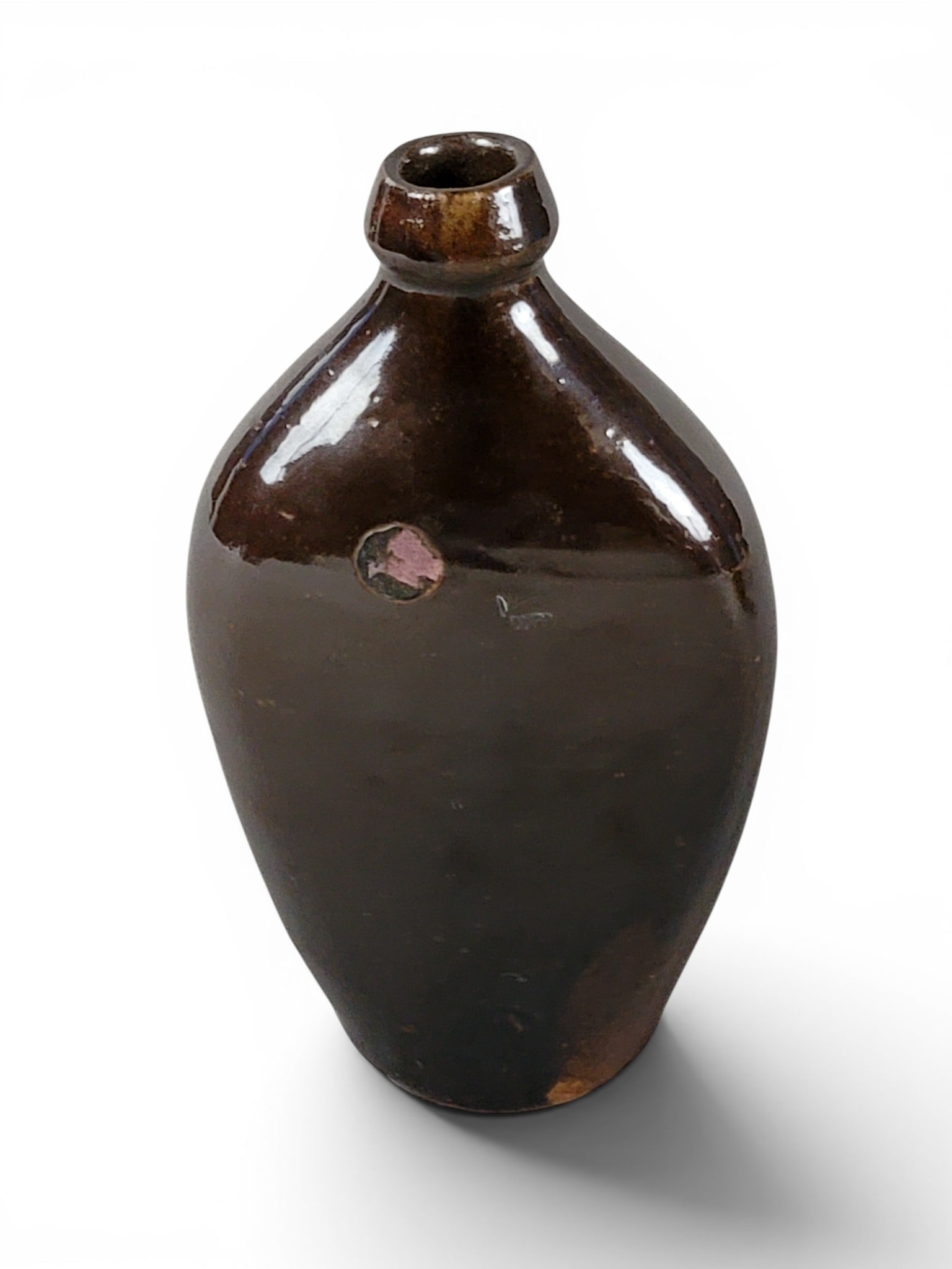 FOUR POTTERY FLASKS - 9