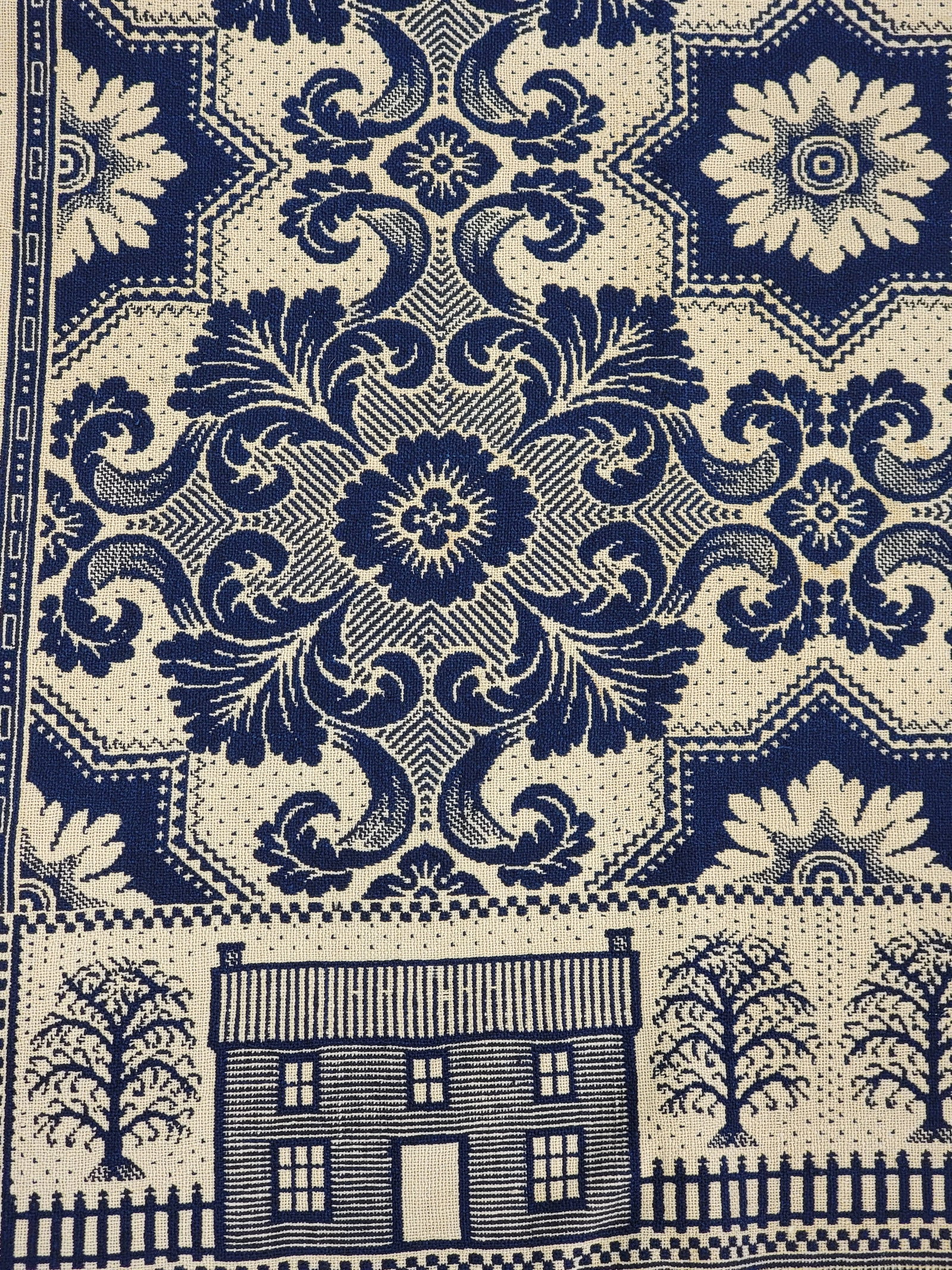 INDIANA COVERLET WITH SAILBOAT: William or Joseph Gilmour, Union County, Indiana, dated 1841. Blue and white, floral field, and the borders with houses and birds, and with sailboats in the corners. 90.5" by 75.25". See Montgomery, I