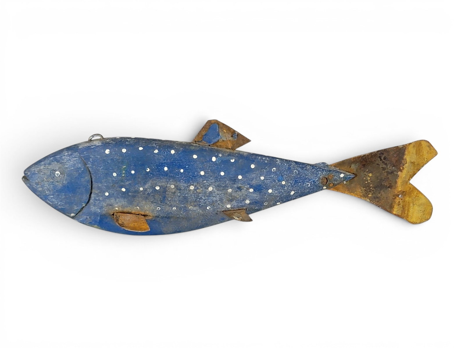 FISH DECOY: Attributed to Minnesota, 20th century. Blue fish with white spots and tin fins. 12" long. Provenance: an Ohio collection. NOTE: We are happy to answer questions and take additional photos of lots