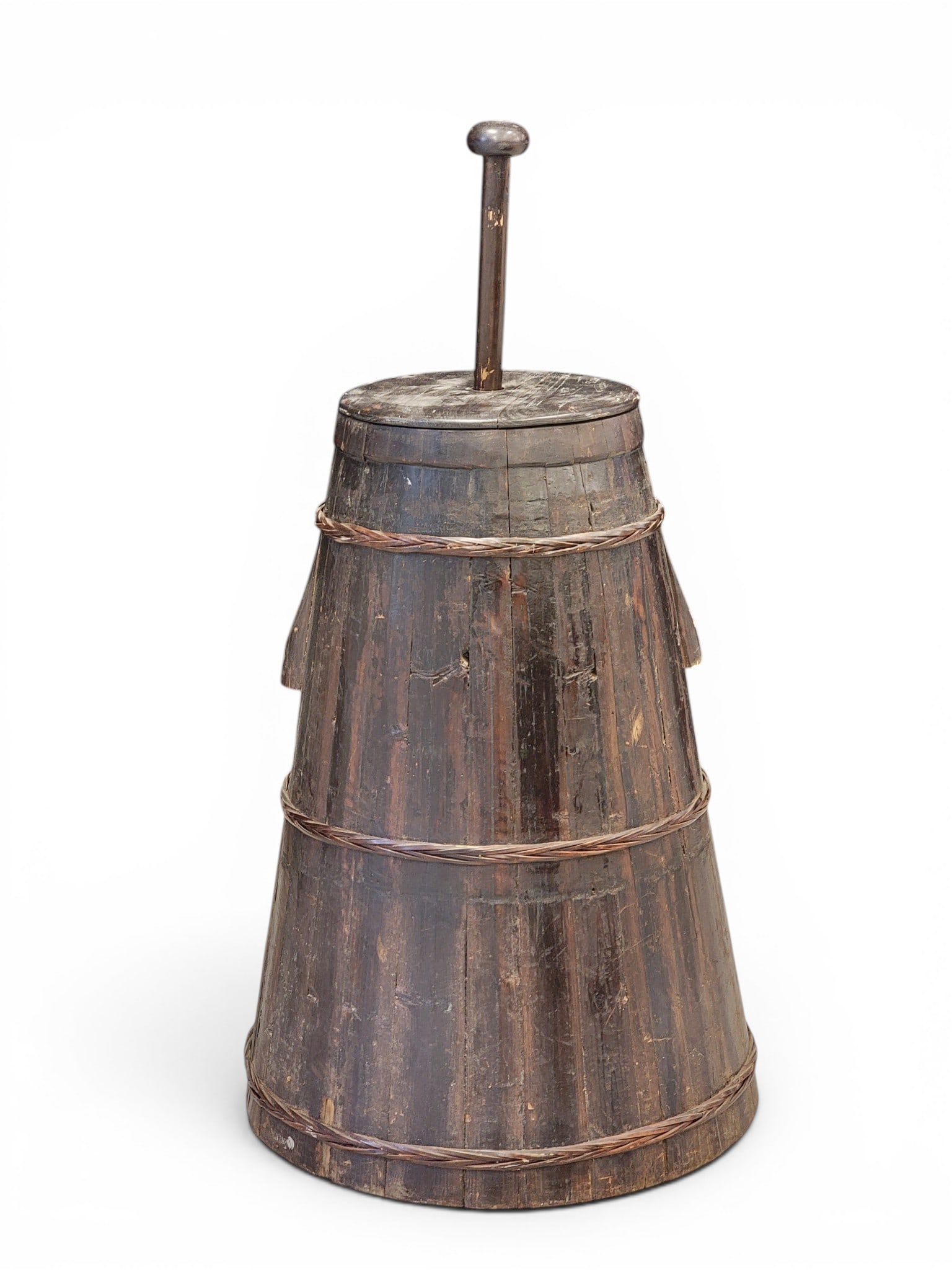BUTTER CHURN: 19th century. Large size, stave-constructed, with woven bands. 42" high (including dasher). NOTE: We are happy to answer questions and take additional photos of lots prior to the auction (the sooner