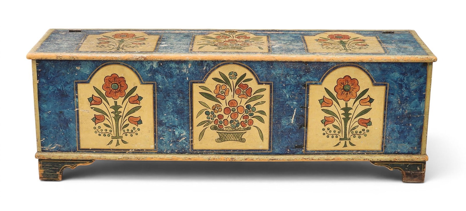 DECORATED WOOD BOX: American, 19th century, pine. Divided interior, bracket feet, and with later Pennsylvania-style paint decoration. 16.25" high, 63" wide, 18.75" deep. Provenance: Collection of Bob and Maxine Edwards,