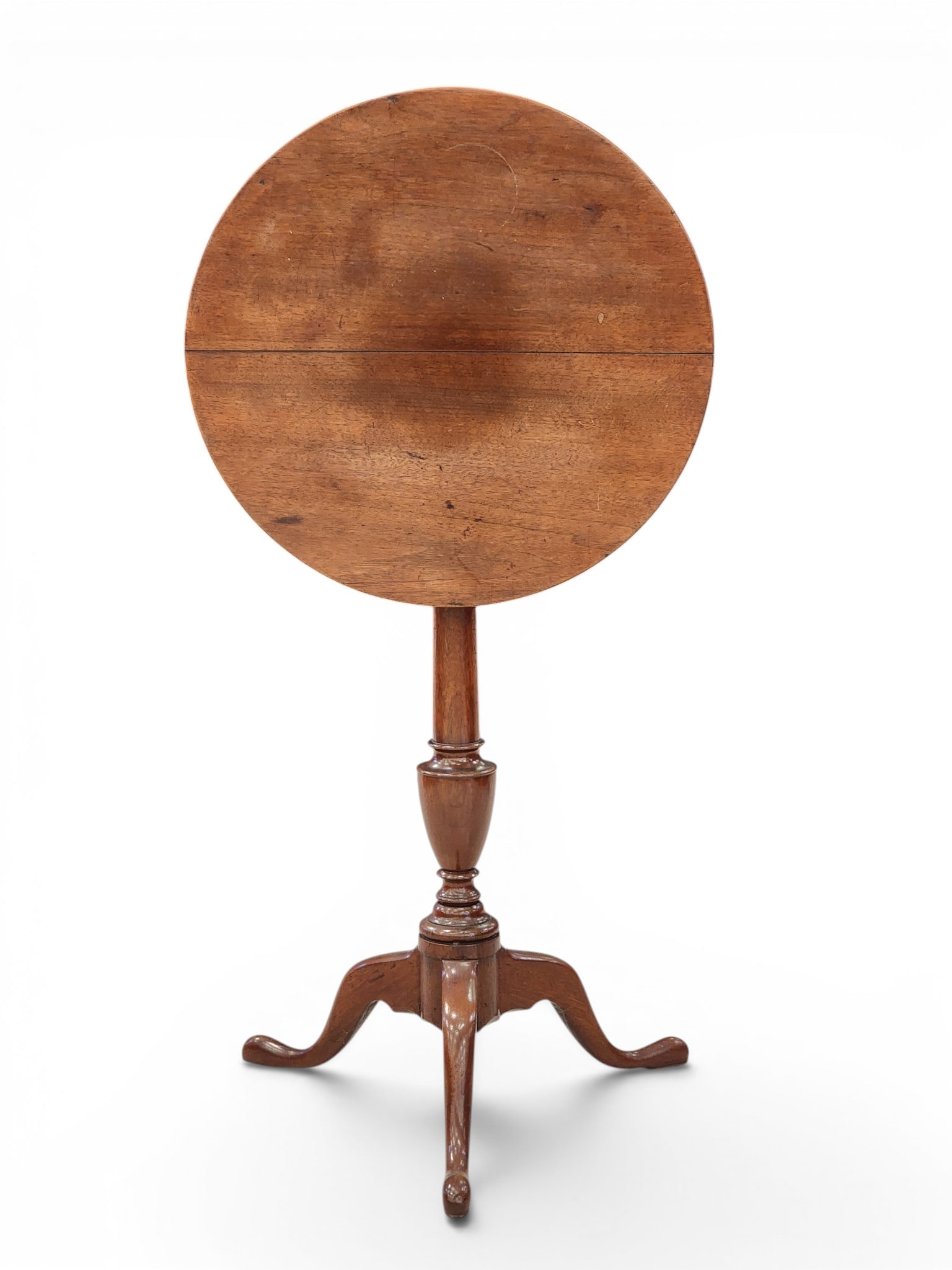 TWO TILT-TOP TABLES: American, 19th century, mahogany. Includes a round-top candlestand, 29.5" high; together with a shaped-top tea table with birdcage tilting mechanism, 28.5" high, 18.75" square. Provenance: Collection