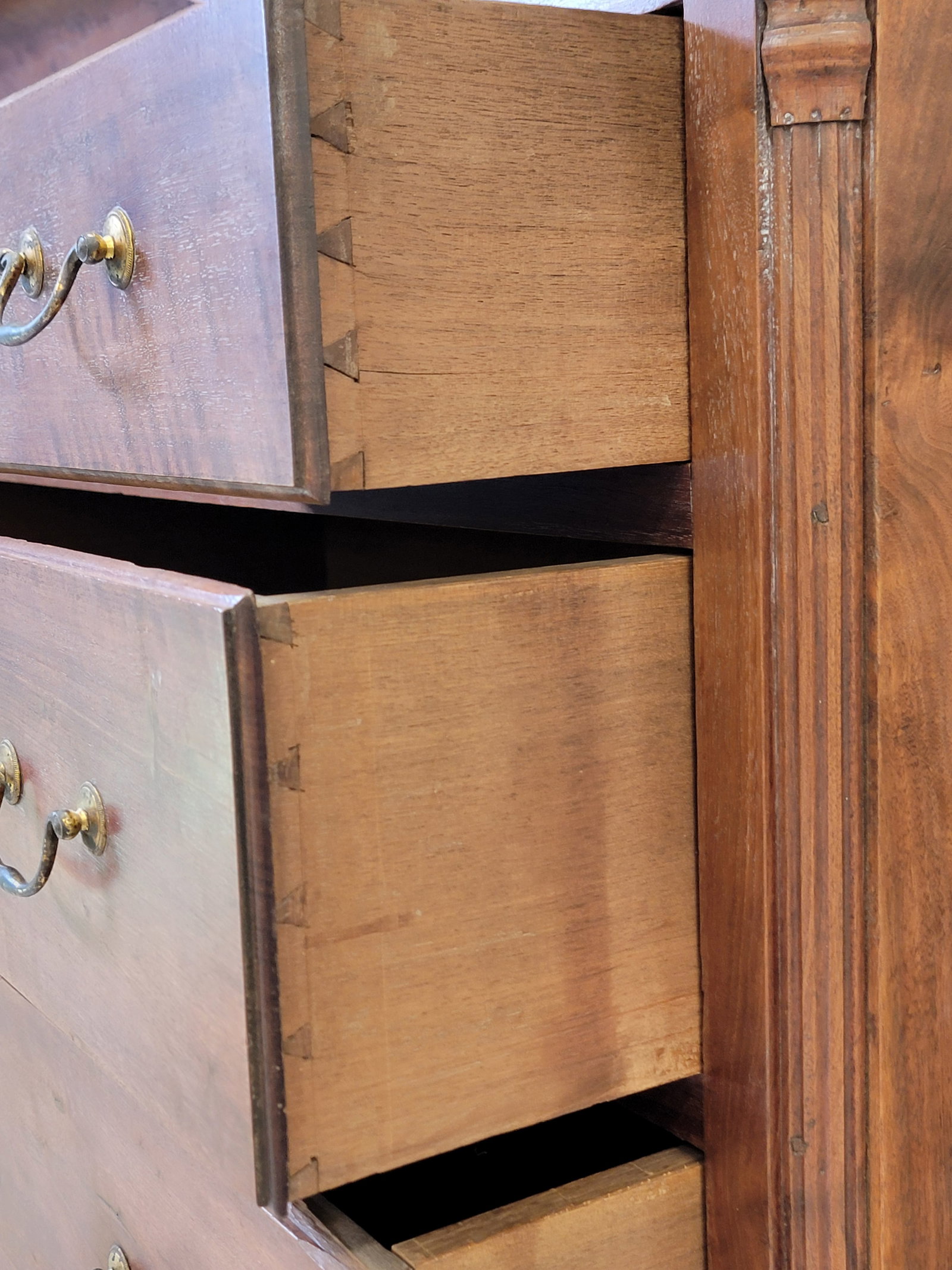 CHIPPENDALE TALL CHEST OF DRAWERS: Pennsylvania, 1780-1810, walnut, pine, and poplar. Three over five drawers flanked by fluted quarter columns, and on ogee bracket feet. 63.5" high, 46" wide, 24" deep. Provenance: Collection of Bob