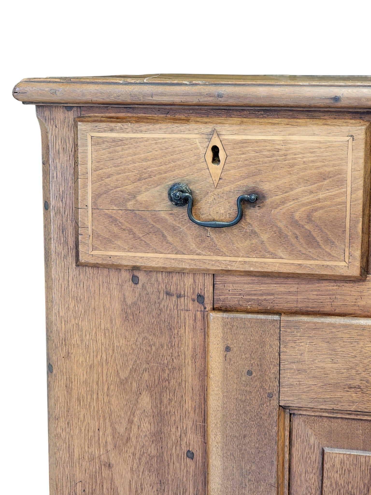 INLAID PENNSYLVANIA CUPBOARD: Eastern PA, late 18th-early 19th century, walnut and poplar. Dovetailed case, with three inlaid drawers over a double-raised-panel door, and on high bracket feet. 49" high, 38" wide, 20" deep.