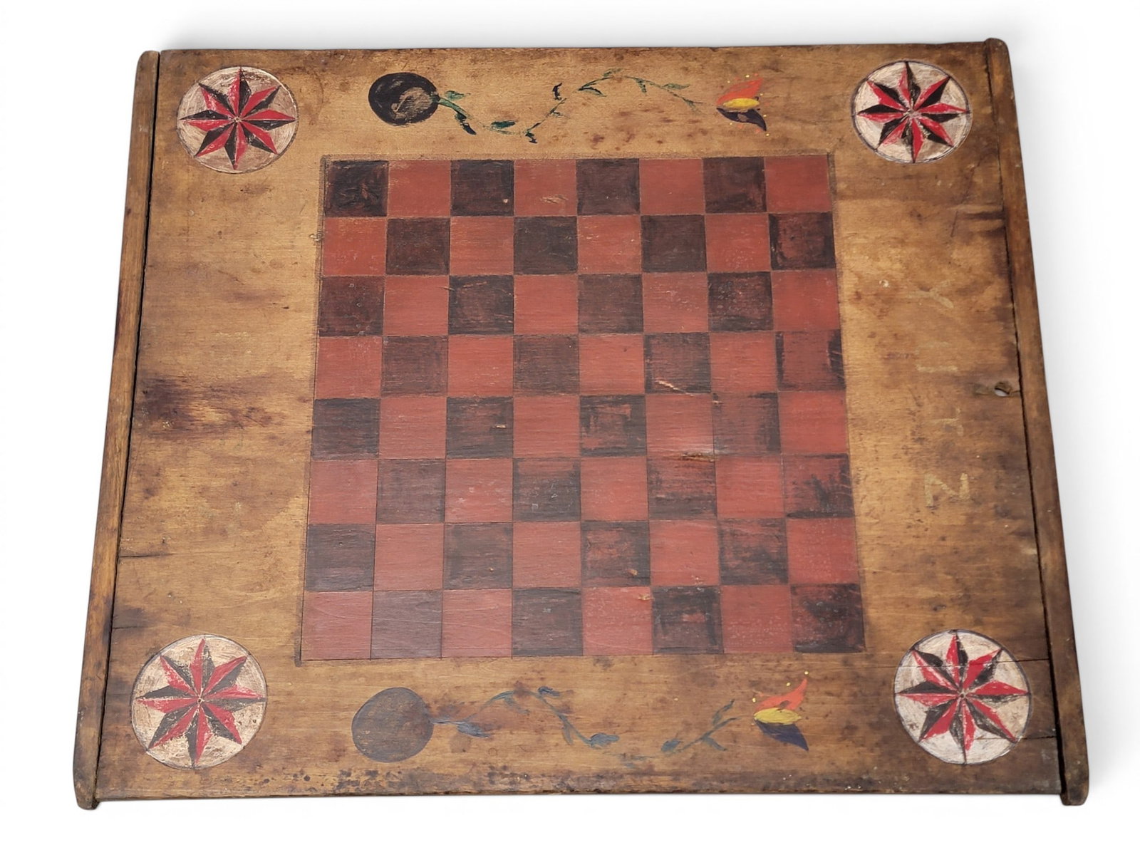 DECORATED GAMEBOARD: American, late 19th-20th century, poplar. An early breadboard-end cutting board later converted to a gameboard. 21.5" by 18.25". Provenance: Collection of Bob and Maxine Edwards, New Philadelphia,