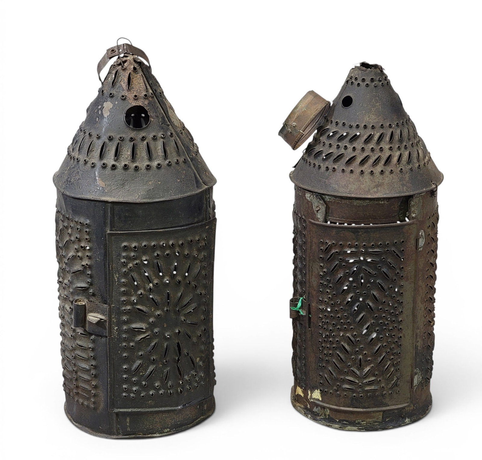 TWO PUNCHED TIN LANTERNS: American, 19th century. Of typical form. 12.5" high. Provenance: Collection of Bob and Maxine Edwards, New Philadelphia, Ohio. NOTE: We are happy to answer questions and take additional photos of