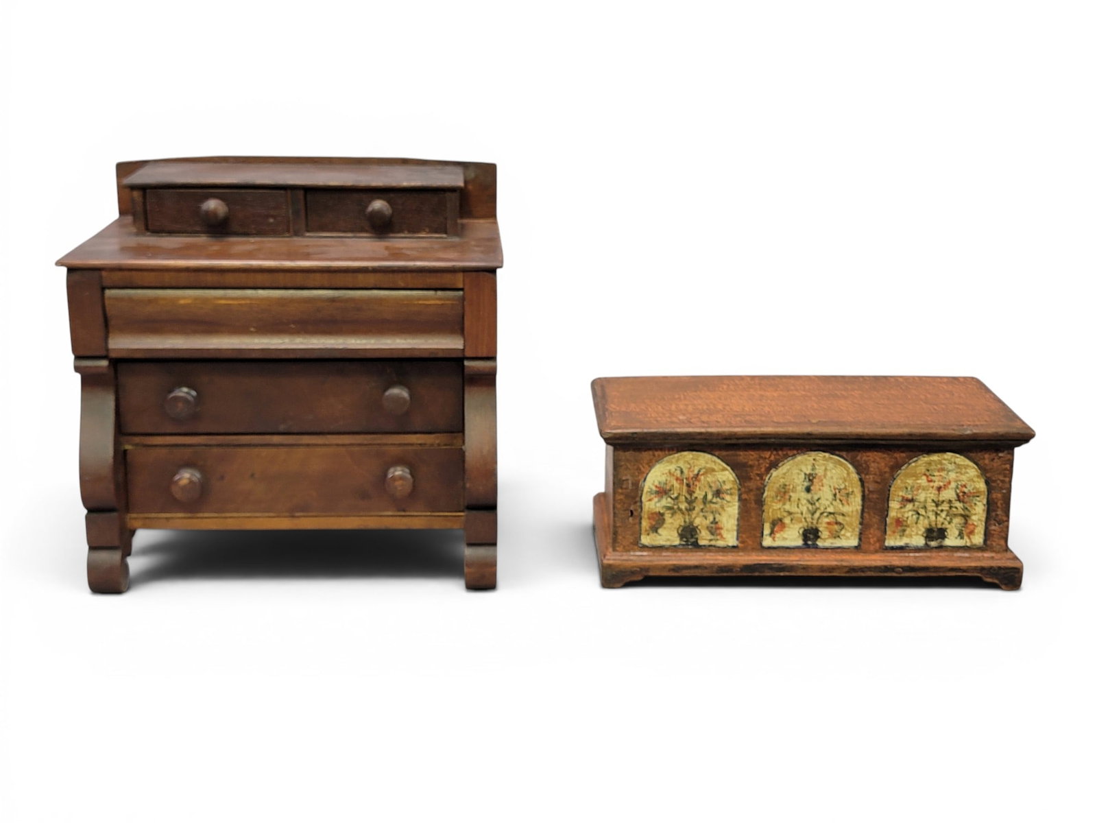 TWO PIECES OF MINIATURE FURNITURE: American, 19th century. Includes a cherry classical chest with two over three drawers and scrolled legs, 9" high, 9.25" wide, 6" deep; together with a dovetailed poplar blanket chest with bracket