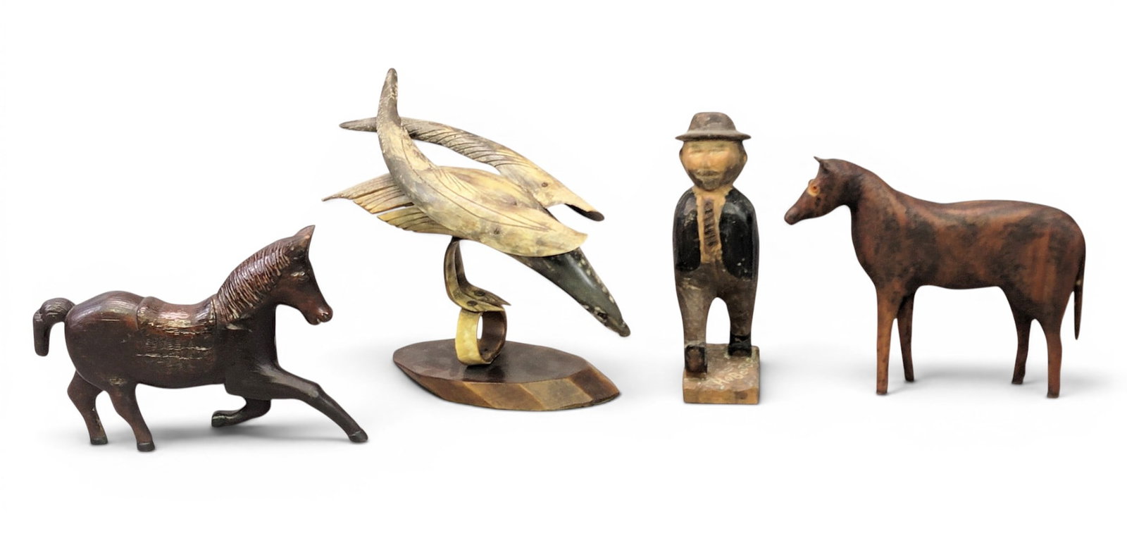 FOUR FOLK ART CARVINGS (1 of 10)