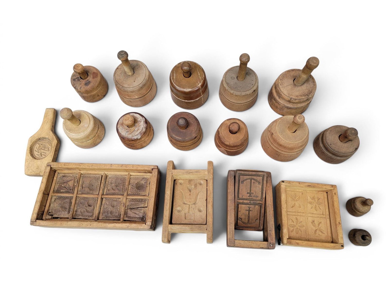 COLLECTION OF CASED BUTTER MOLDS: American, 19th century. Included boxed springerle-type molds and round cased molds, mostly plants and flowers. Various sizes. Provenance: Collection of Bob and Maxine Edwards, New Philadelphia, Ohio.