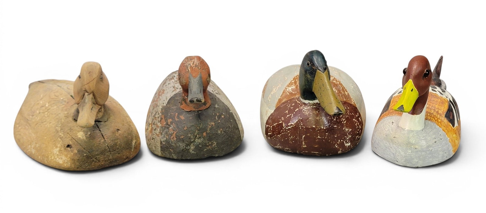 FOUR DUCK DECOYS (1 of 14)