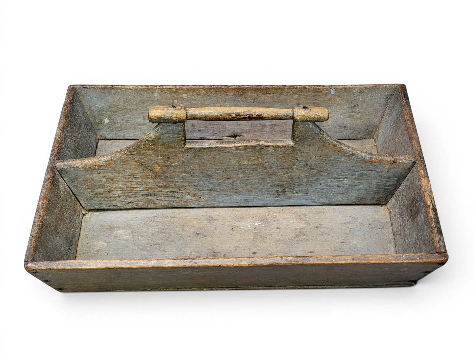 PAINTED WALL BOX AND CUTLERY TRAY: American, late 19th-early 20th century, poplar. Lidded wall box in old green paint, 9.75" high; together with a cutlery tray with turned handle and old gray paint, 12.75" long. Provenance: Collection 