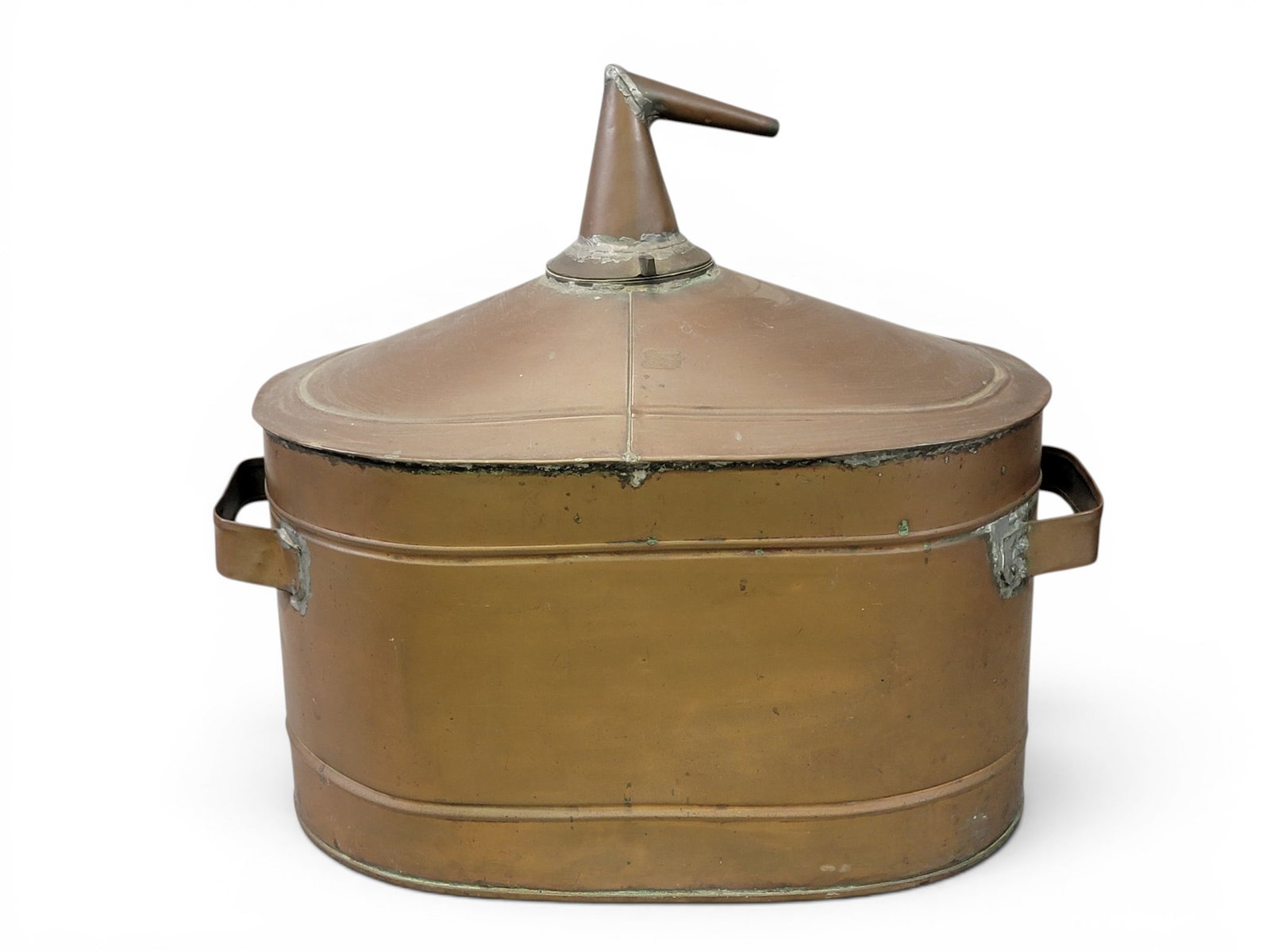 COPPER STILL: American, 19th century. Made from a copper tub. 19" high, 22" long. Provenance: a Pennsylvania collection. NOTE: We are happy to answer questions and take additional photos of lots prior to the auctio