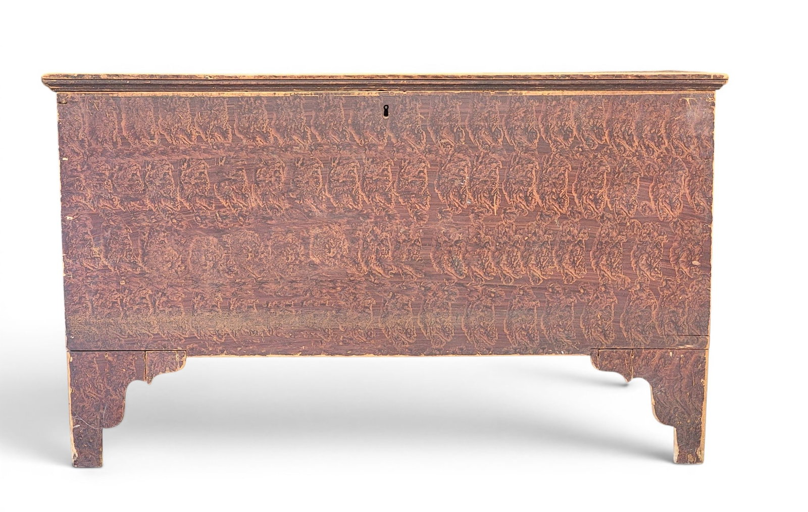 DECORATED BLANKET CHEST: American, early 19th century, poplar. Bootjack ends and retains its original putty decoration. 24.75" high, 41.75" wide, 17.5" deep. Provenance: a Pennsylvania collection. NOTE: We are happy to