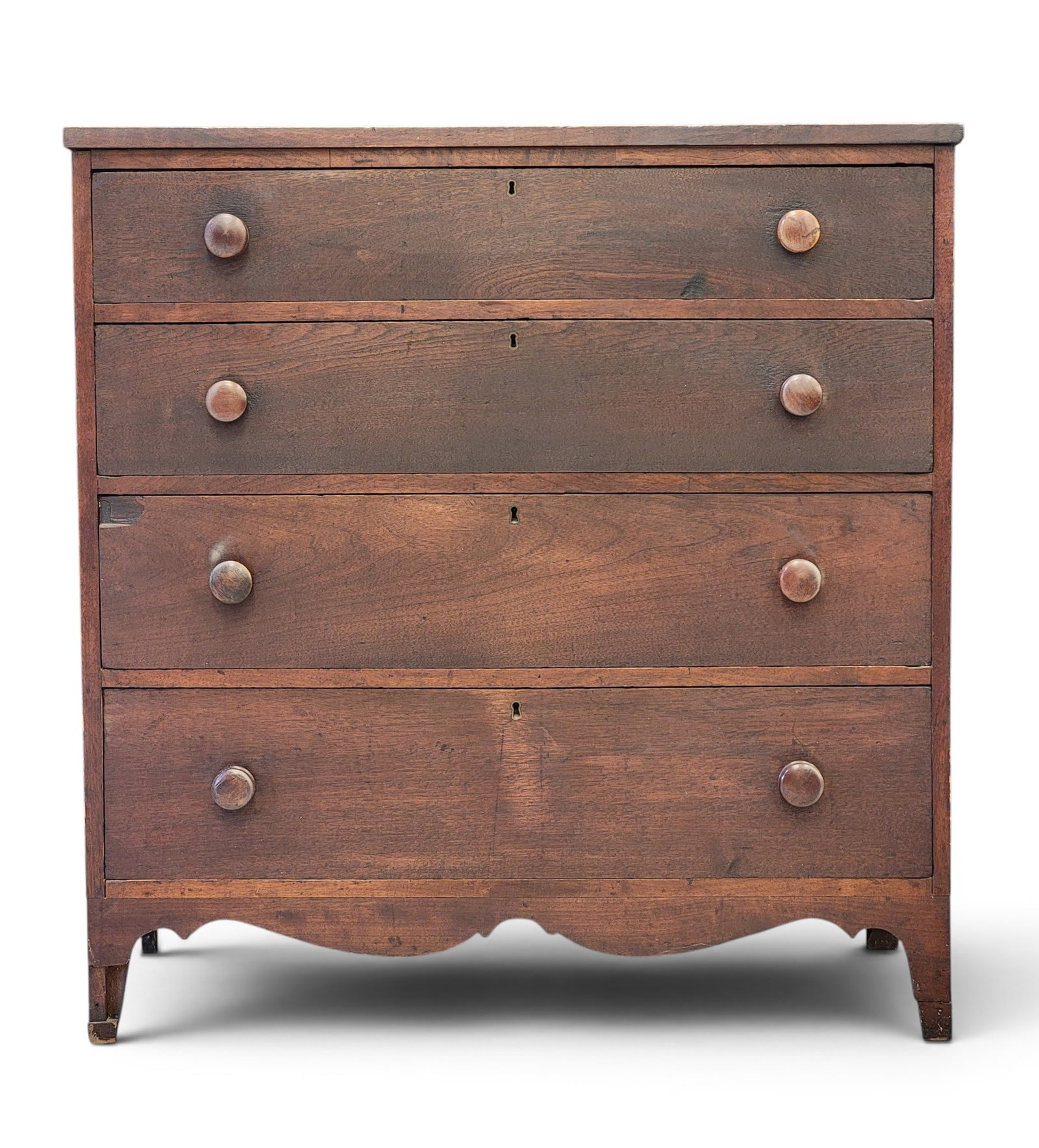 HEPPLEWHITE CHEST OF DRAWERS: American, early 19th century, walnut, poplar, and sycamore. Four graduated drawers on French feet. 42.25" high, 40.75" wide, 21.5" deep. Provenance: a Pennsylvania collection. NOTE: We are happy to an