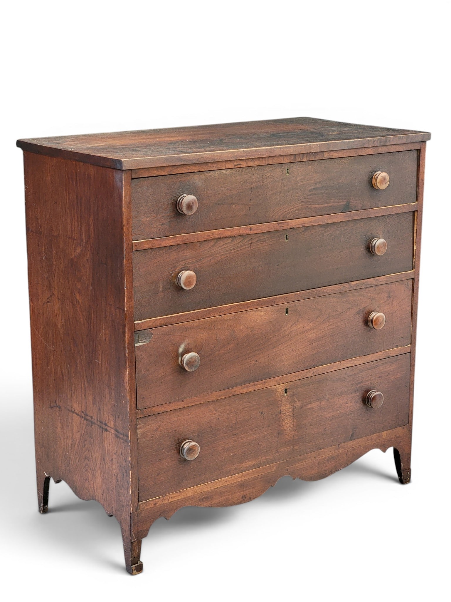 HEPPLEWHITE CHEST OF DRAWERS: American, early 19th century, walnut, poplar, and sycamore. Four graduated drawers on French feet. 42.25" high, 40.75" wide, 21.5" deep. Provenance: a Pennsylvania collection. NOTE: We are happy to an