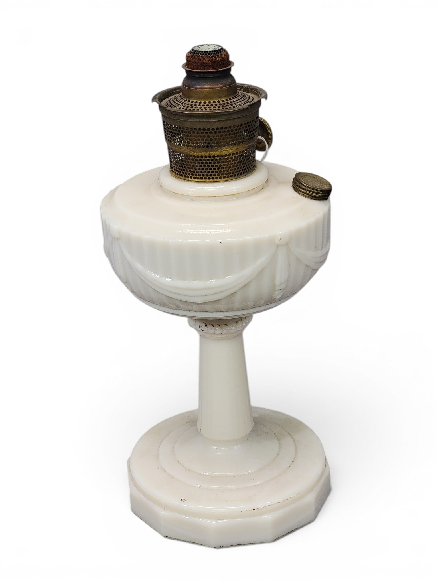 THREE LAMPS: Includes an Aladdin Lincoln Drape oil lamp, 13.5" high; together with a Clement Hull for Van Briggle art pottery lamp, 20" high (including harp); and a painted lamp with Middle Eastern-themed glass sh