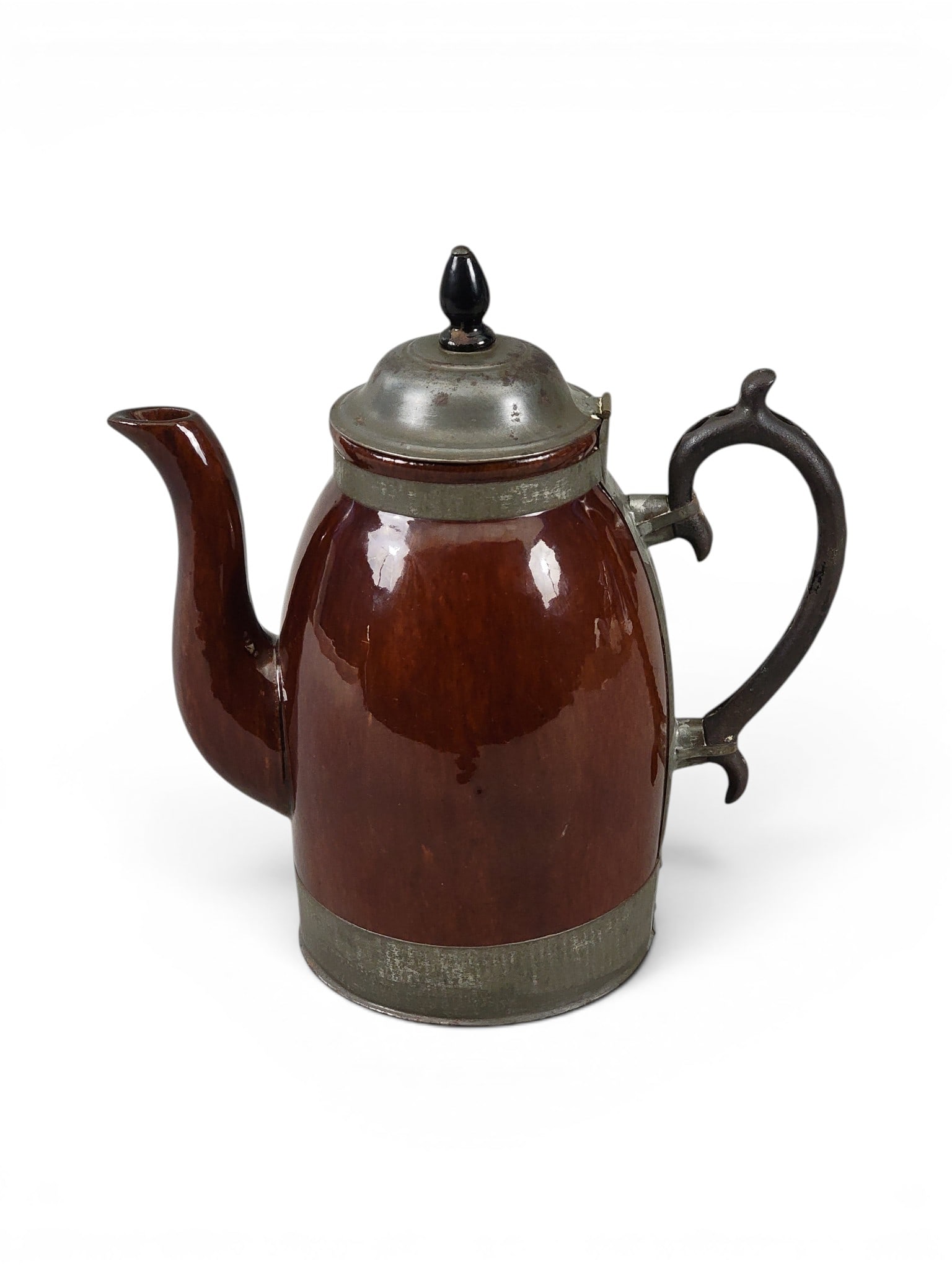 ST. LOUIS-MADE ROCKINGHAM COFFEE POT: Marked for Fridolin Schifferle, St. Louis, Missouri, patented 1876. Rocking pot with metal bands, handle, and lid. 11" high. Schifferle was maker of various cooking items, including stoves, as well