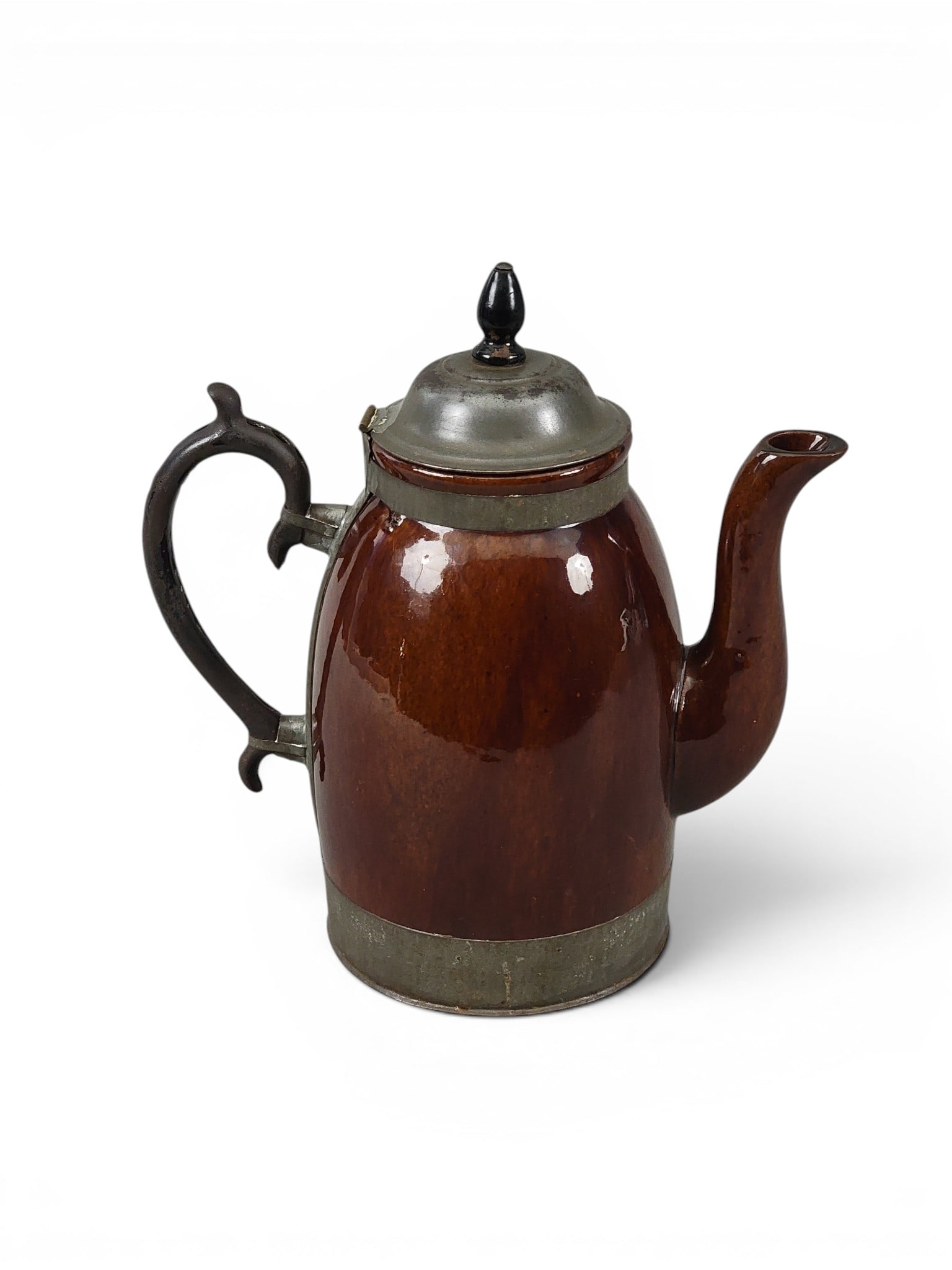 ST. LOUIS-MADE ROCKINGHAM COFFEE POT: Marked for Fridolin Schifferle, St. Louis, Missouri, patented 1876. Rocking pot with metal bands, handle, and lid. 11" high. Schifferle was maker of various cooking items, including stoves, as well as