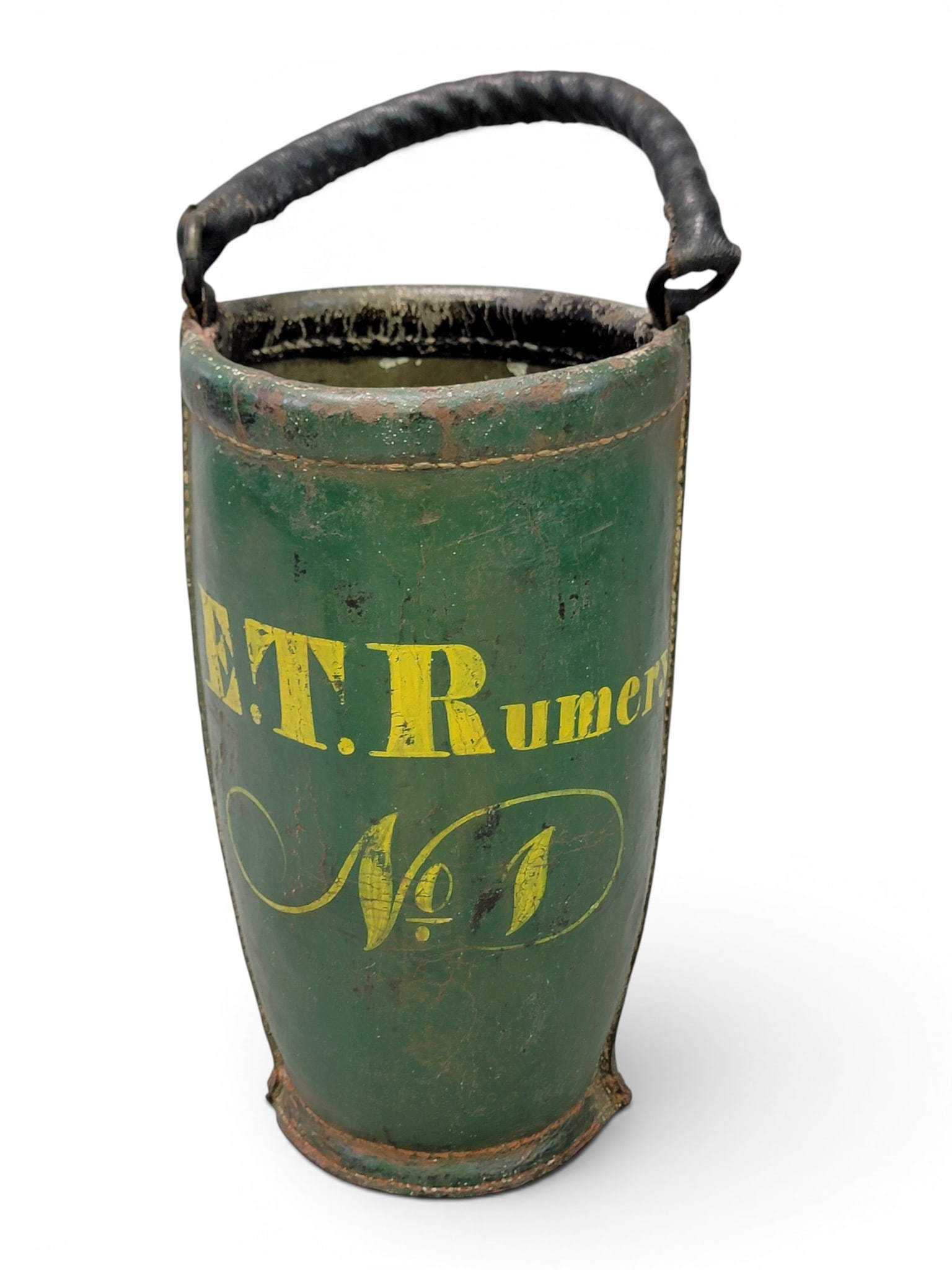DECORATED LEATHER FIRE BUCKET: American, 1820-1840. Of typical form, with its original paint, including "E.T. Rumer / No. 1" in yellow against a green ground. 15" high. Provenance: a Wisconsin collection. NOTE: We are happy to