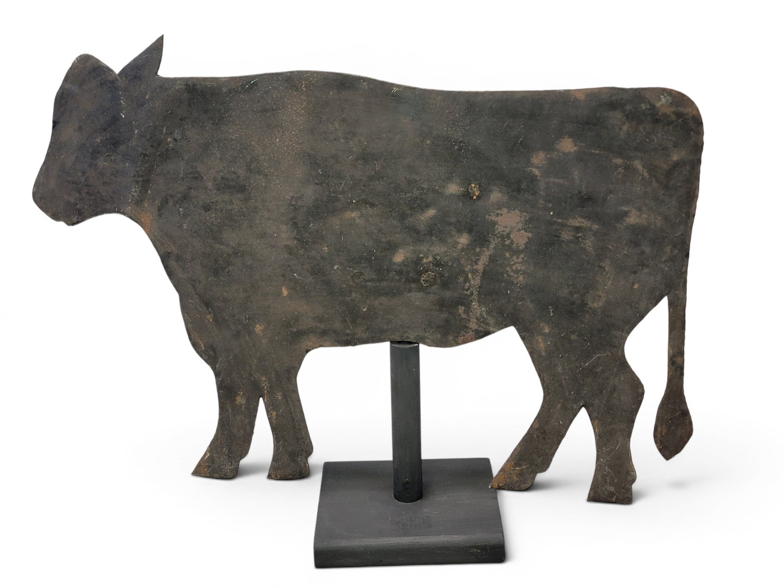 COW WEATHERVANE: American, 1st half-20th century, sheet iron. Small size, on a modern stand. 21" long. Provenance: an Ohio collection. NOTE: We are happy to answer questions and take additional photos of lots prior