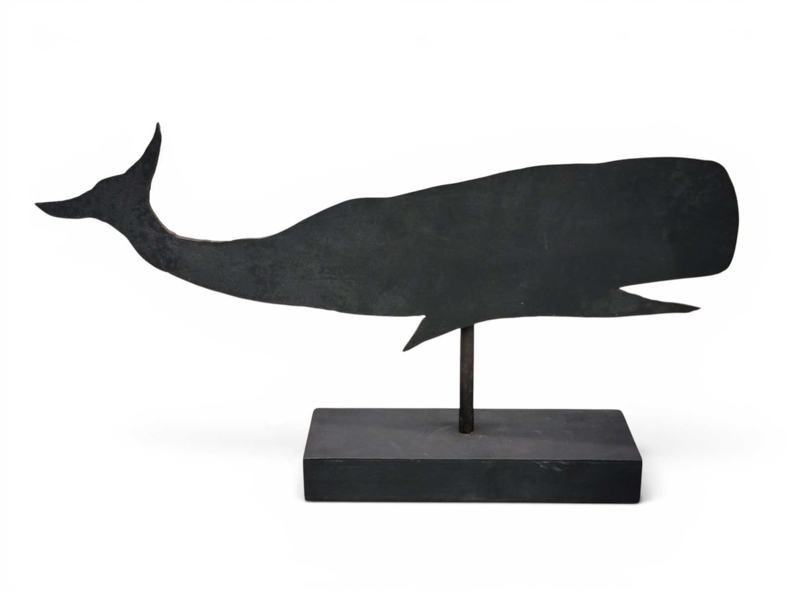 WHALE WEATHERVANE: Probably New England, mid-20th century, sheet iron. Small size, on a modern stand. 21" long. Provenance: an Ohio collection. NOTE: We are happy to answer questions and take additional photos of lots