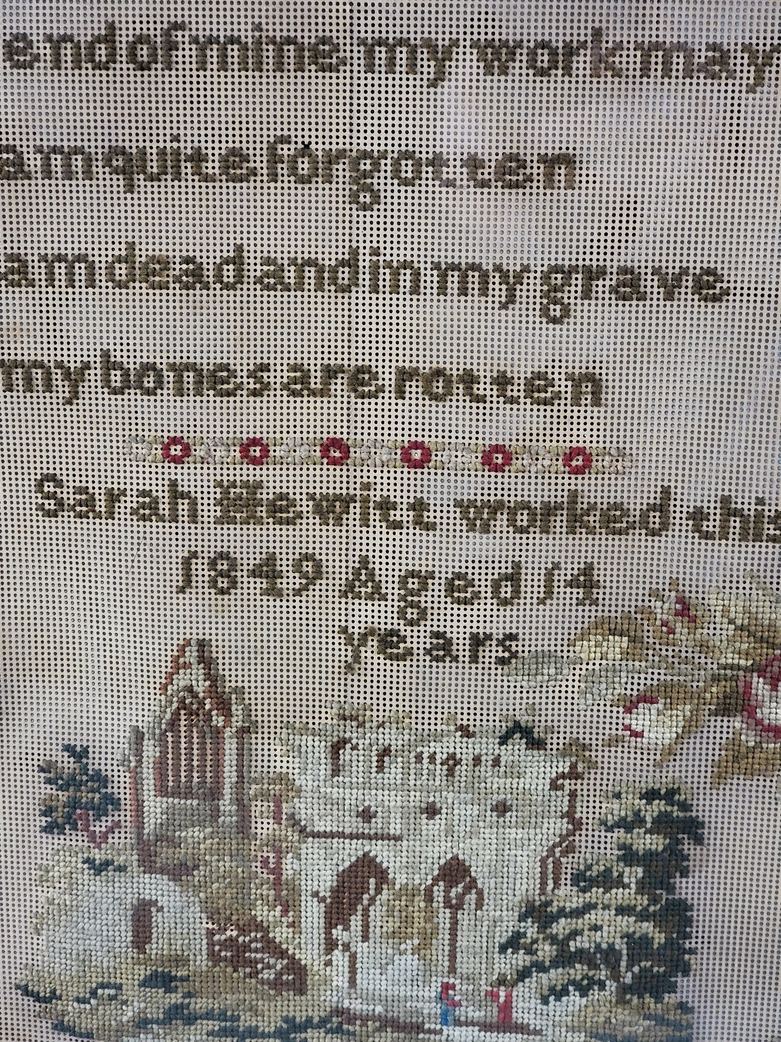 SCHOOLGIRL NEEDLEWORK: American, 1849, wool on punched paper. Large sampler with verse, trees, flowers, butterfly, and "Sarah Hewitt worked this 1849 Aged 14 years," and with a bold red border. In a period rosewood frame,