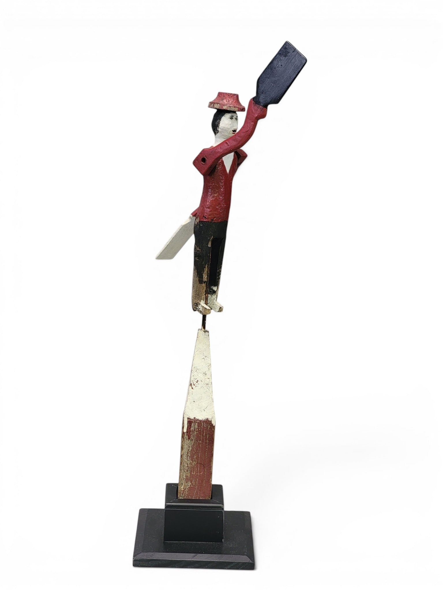 FOLKSY WHIRLIGIG: American, 1st half-20th century. Carved and painted man in a hat, with paddle arms, and on a period/original mount, and a modern base. 27.5" high. Provenance: from the collection of Diane Whyte Miller