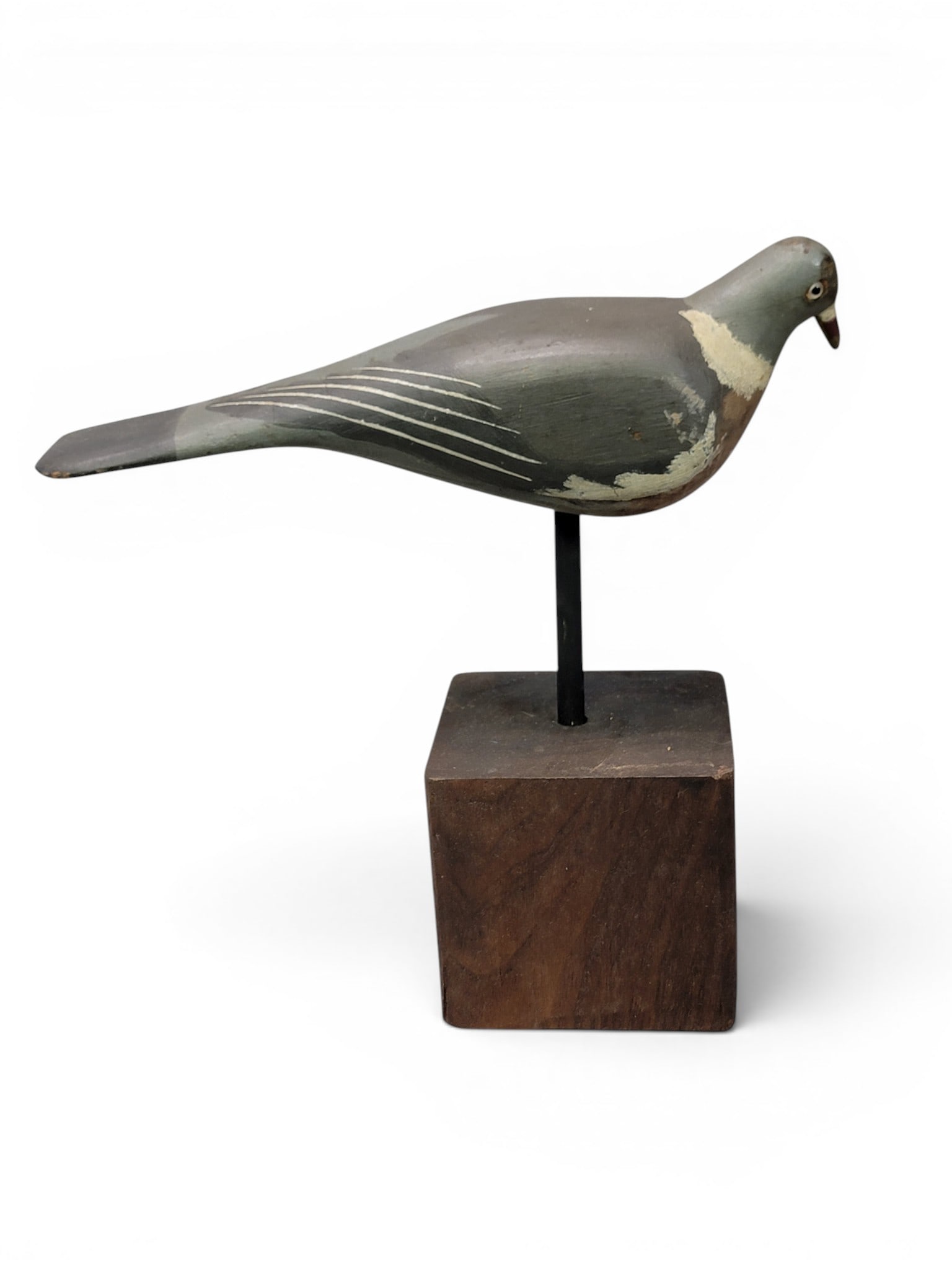 CARVED PIGEON DECOY: American, early/mid-20th century. With glass eyes and on a modern base. 17" high. Provenance: from the collection of Diane Whyte Miller (Virginia). NOTE: We are happy to answer questions and take